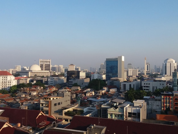 Photo high angle view of buildings in city against clear sky