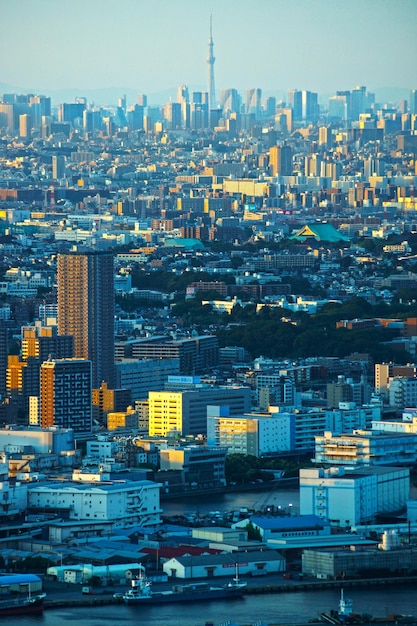 Photo high angle view of buildings in city against sky at dusk