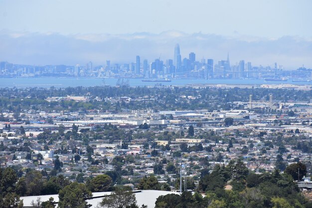 High angle view of buildings in city against sky