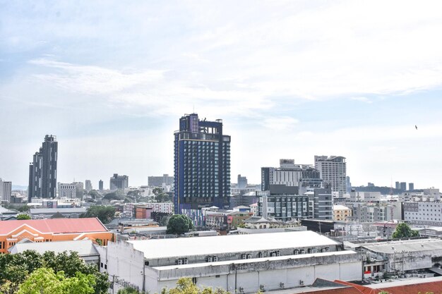 High angle view of buildings in city against sky