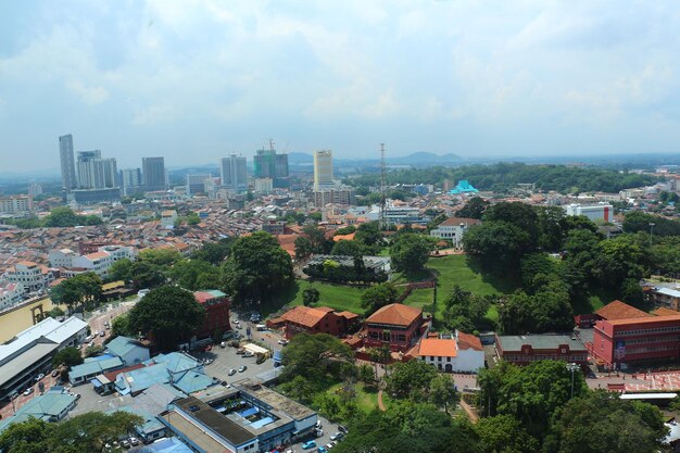 High angle view of buildings in city against sky