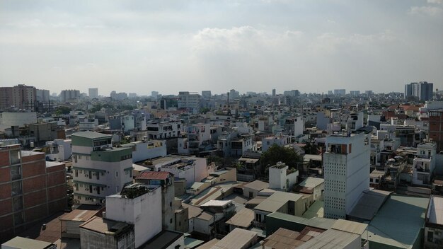 High angle view of buildings in city against sky