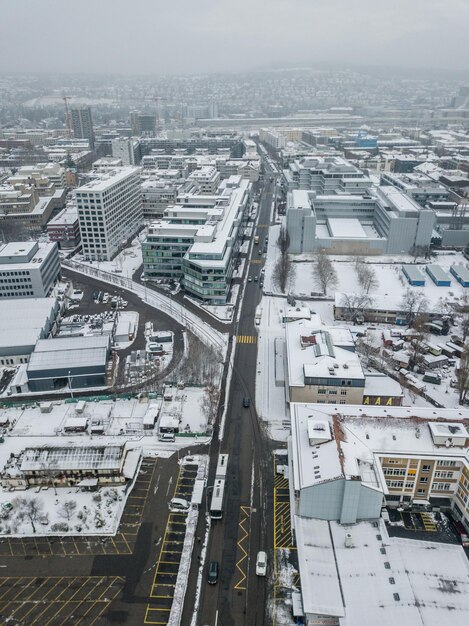 High angle view of buildings in city during winter