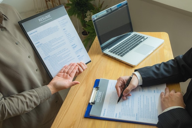 High angle view of businessman taking interview in office