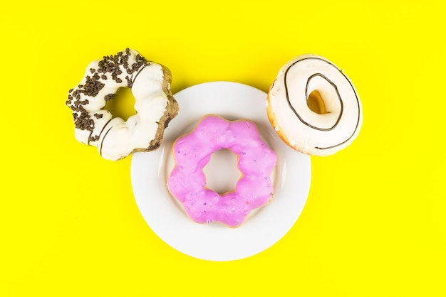 High angle view of cake against yellow background