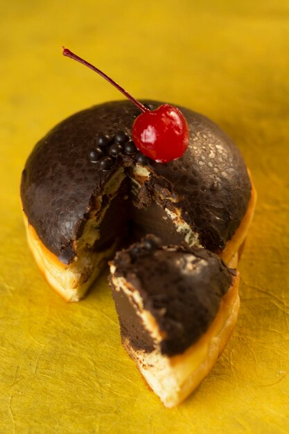 High angle view of cake against yellow background