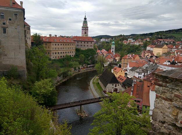 high angle view of canal amidst buildings