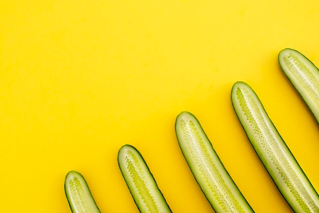 High angle view of candies against yellow background