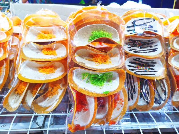 High angle view of candies in glass on table