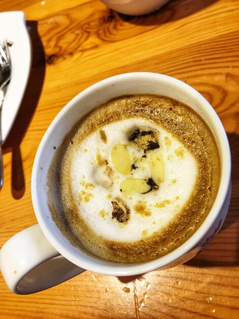 High angle view of cappuccino on table