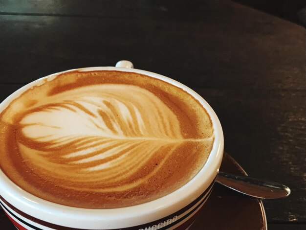 High angle view of cappuccino on table