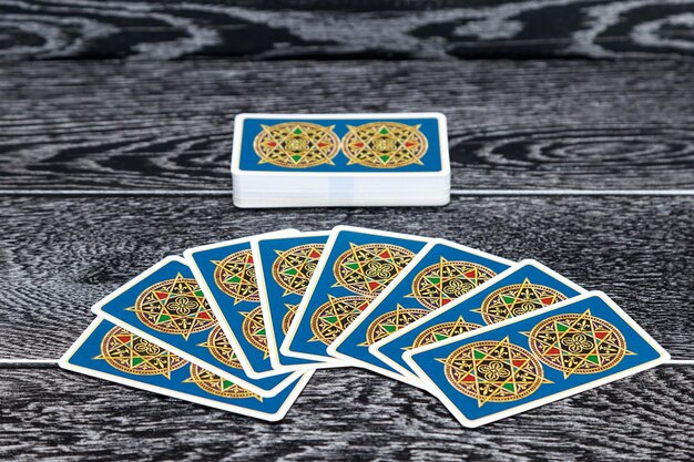 High angle view of cards on wooden table