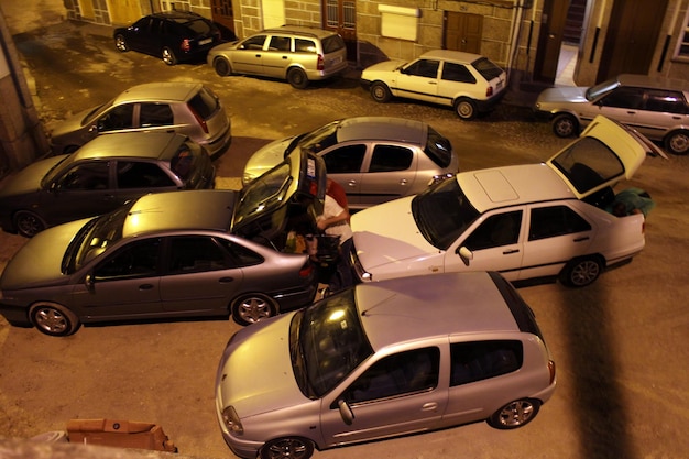 High angle view of cars on illuminated street at night