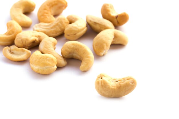 High angle view of cashew on white table background with copy space