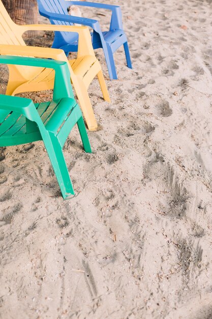 High angle view of chairs on beach