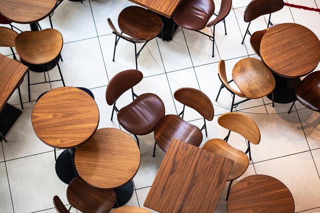 High angle view of chairs on table