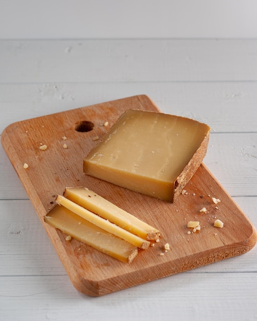 High angle view of cheese on cutting board