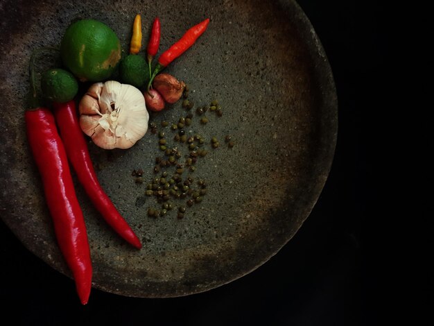 High angle view of chili peppers on table