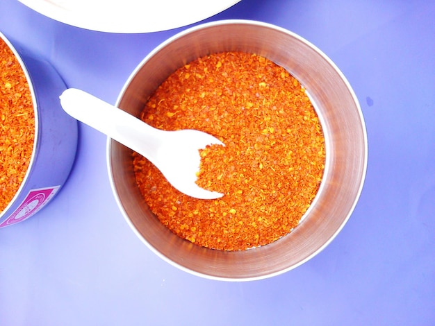 High angle view of chili powder in bowl on table