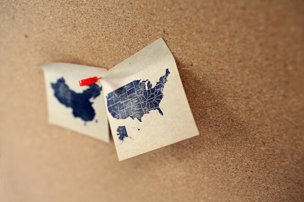 High angle view of china and usa map memo on message board