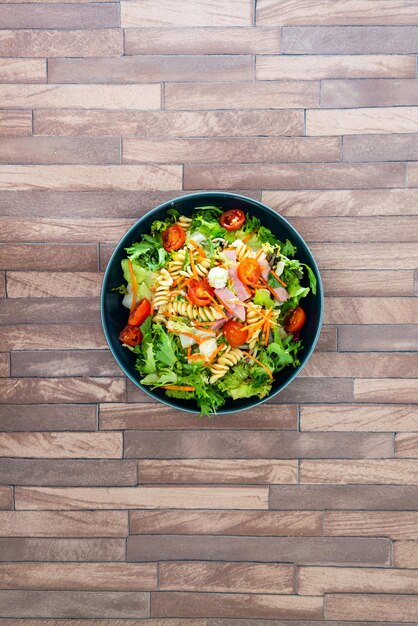 High angle view of chopped vegetables in bowl on table