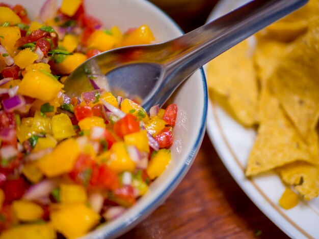 High angle view of chopped vegetables in bowl on table