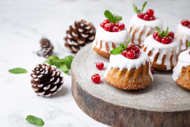 high angle view of christmas muffins with pine cones on table