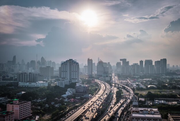 High angle view of city buildings against sky