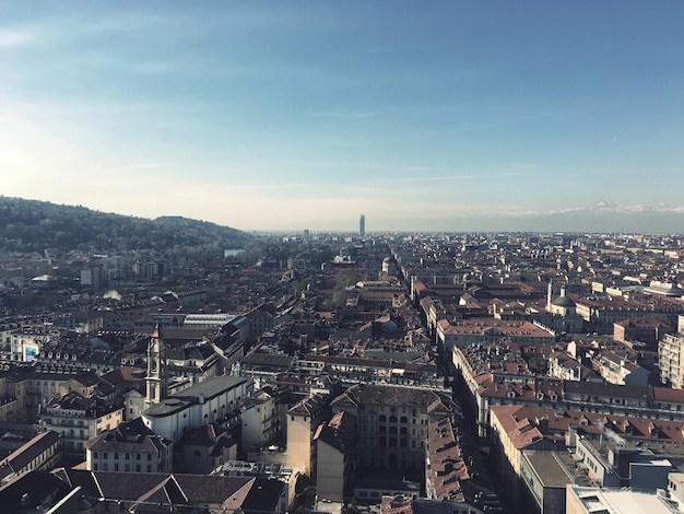 High angle view of city buildings against sky