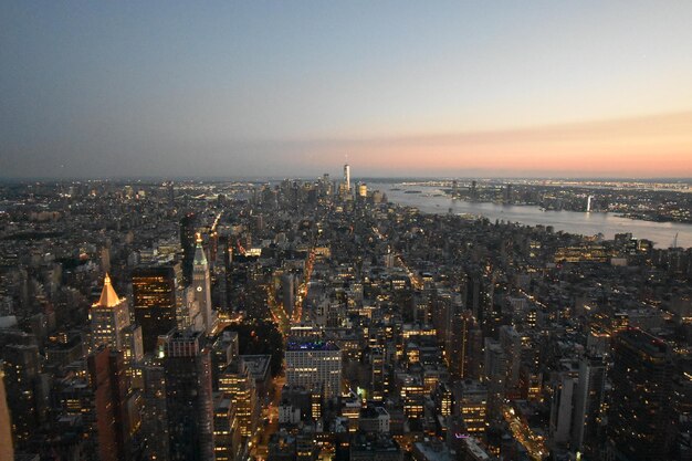 Photo high angle view of city buildings during sunset