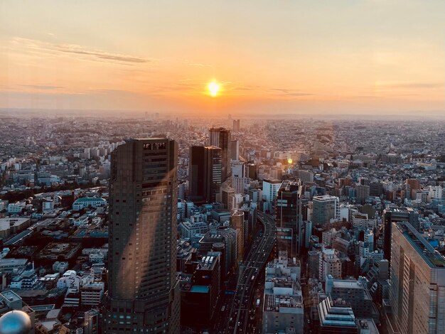 Photo high angle view of city buildings during sunset