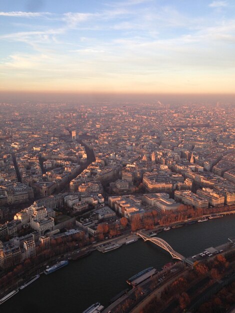 High angle view of city at sunset