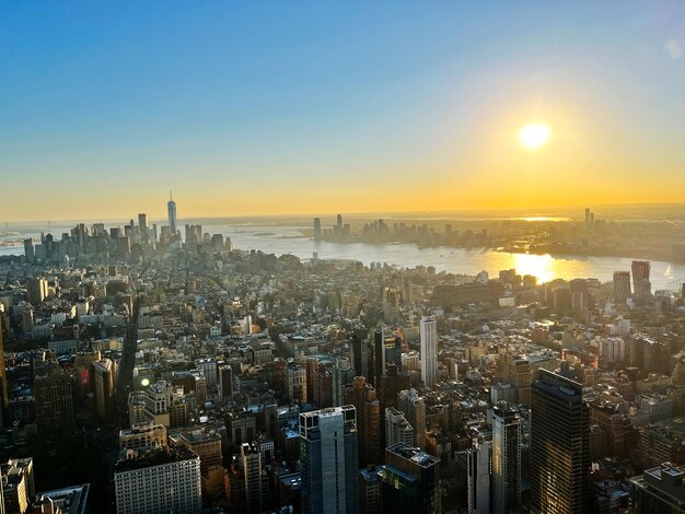 High angle view of city at sunset