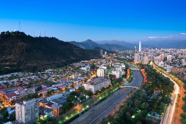 High angle view of cityscape against clear blue sky