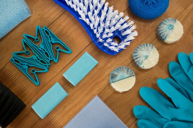 High angle view of cleaning products and brush