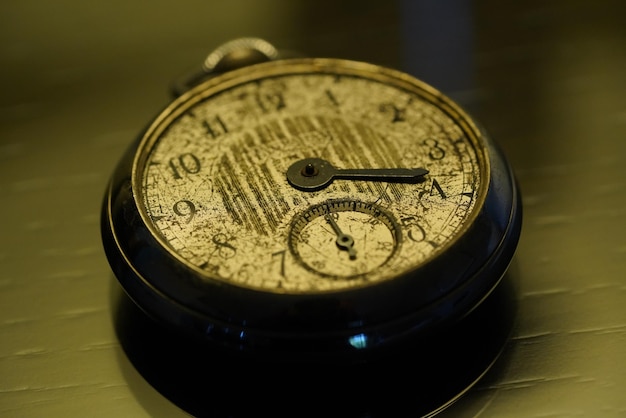 High angle view of clock on table