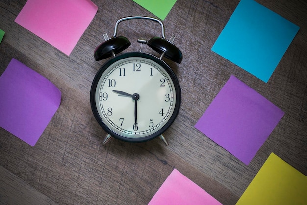 High angle view of clock on table