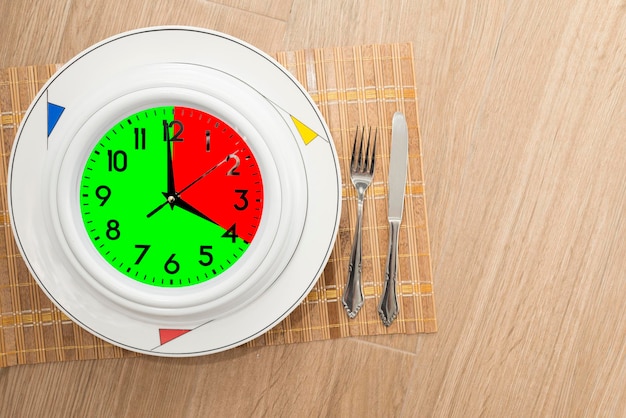 High angle view of clock on table