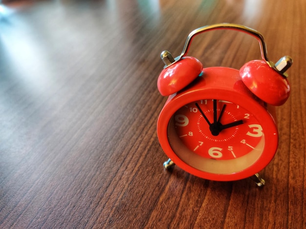 High angle view of clock on table