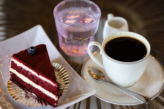 High angle view of coffee and cake on table