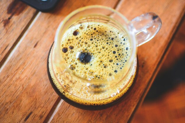 High angle view of coffee cup on table