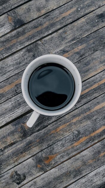 Photo high angle view of coffee cup on table