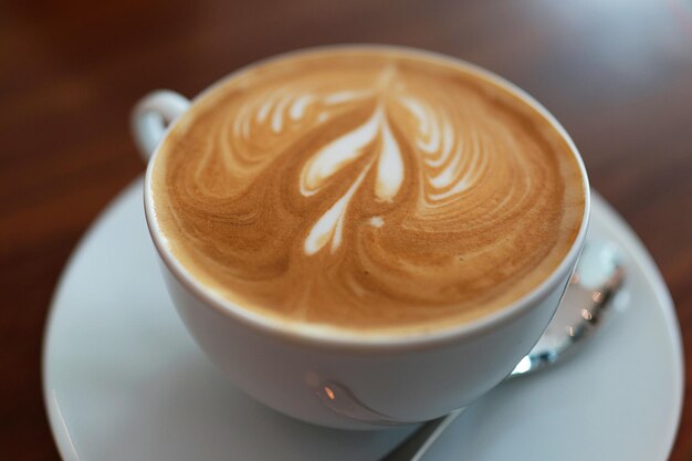 High angle view of coffee cup on table