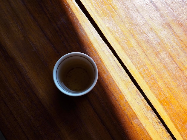 high angle view of coffee cup on table