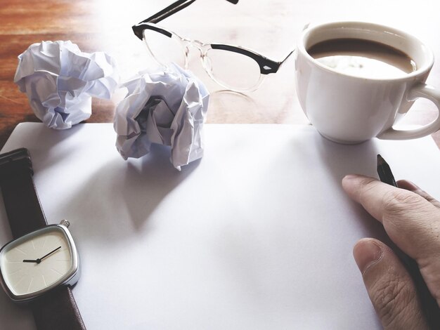 Photo high angle view of coffee cup on table