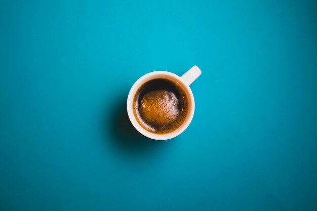 High angle view of coffee cup on table