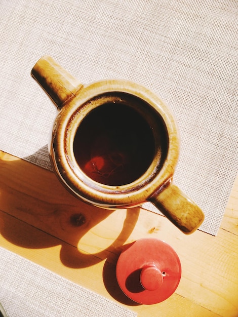 High angle view of coffee cup on table