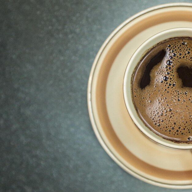 High angle view of coffee cup on table