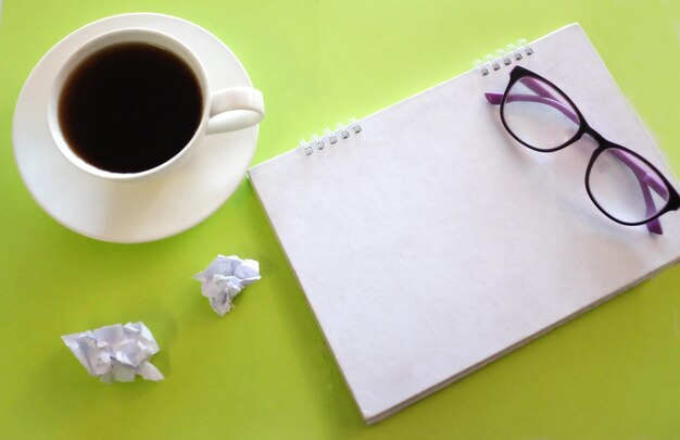 High angle view of coffee cup on table