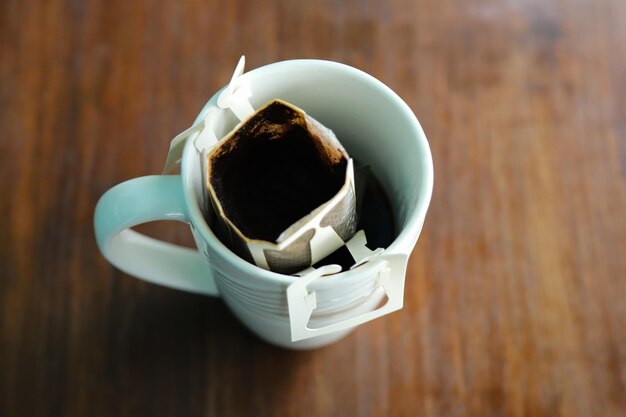 Photo high angle view of coffee cup on table